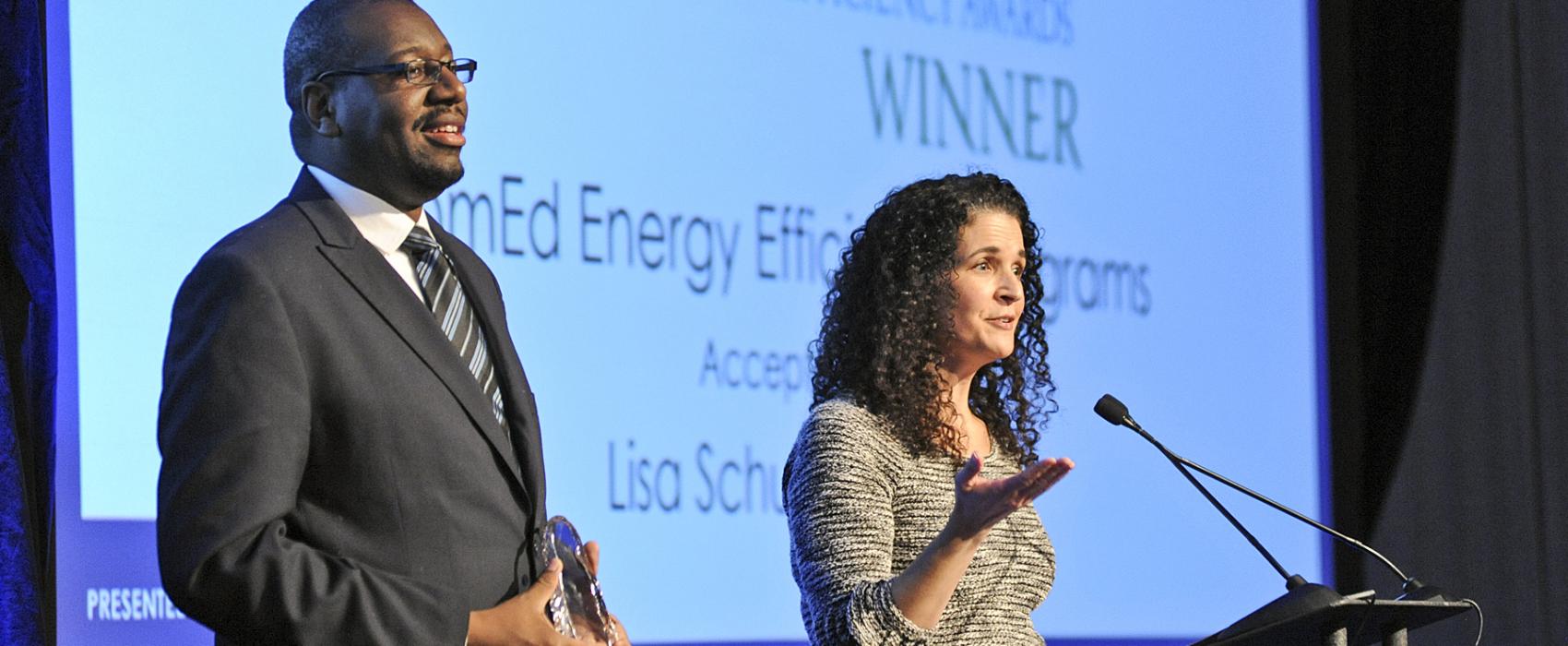 A woman speaks at a podium accepting the innovation award at the 2018 Inspiring Efficiency Awards