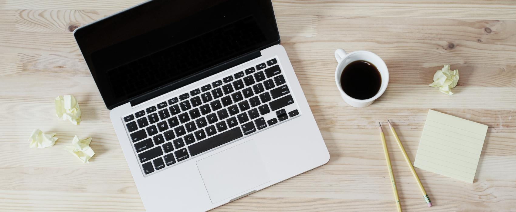 laptop with coffee mug